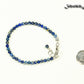 4mm Lapis Lazuli Anklet with Clasp beside a dime.