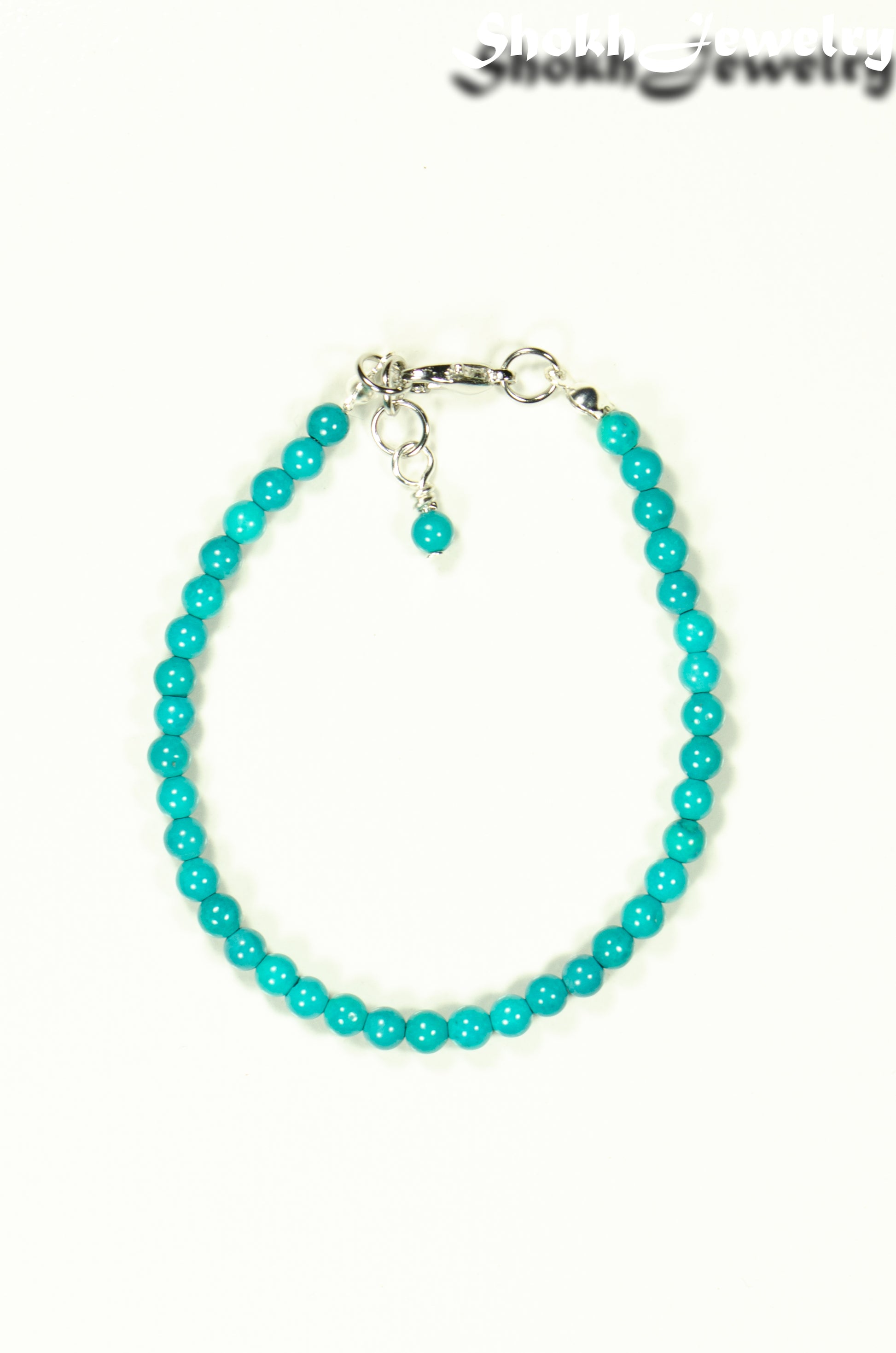 Top view of 4mm Turquoise Stone Bracelet with Clasp.
