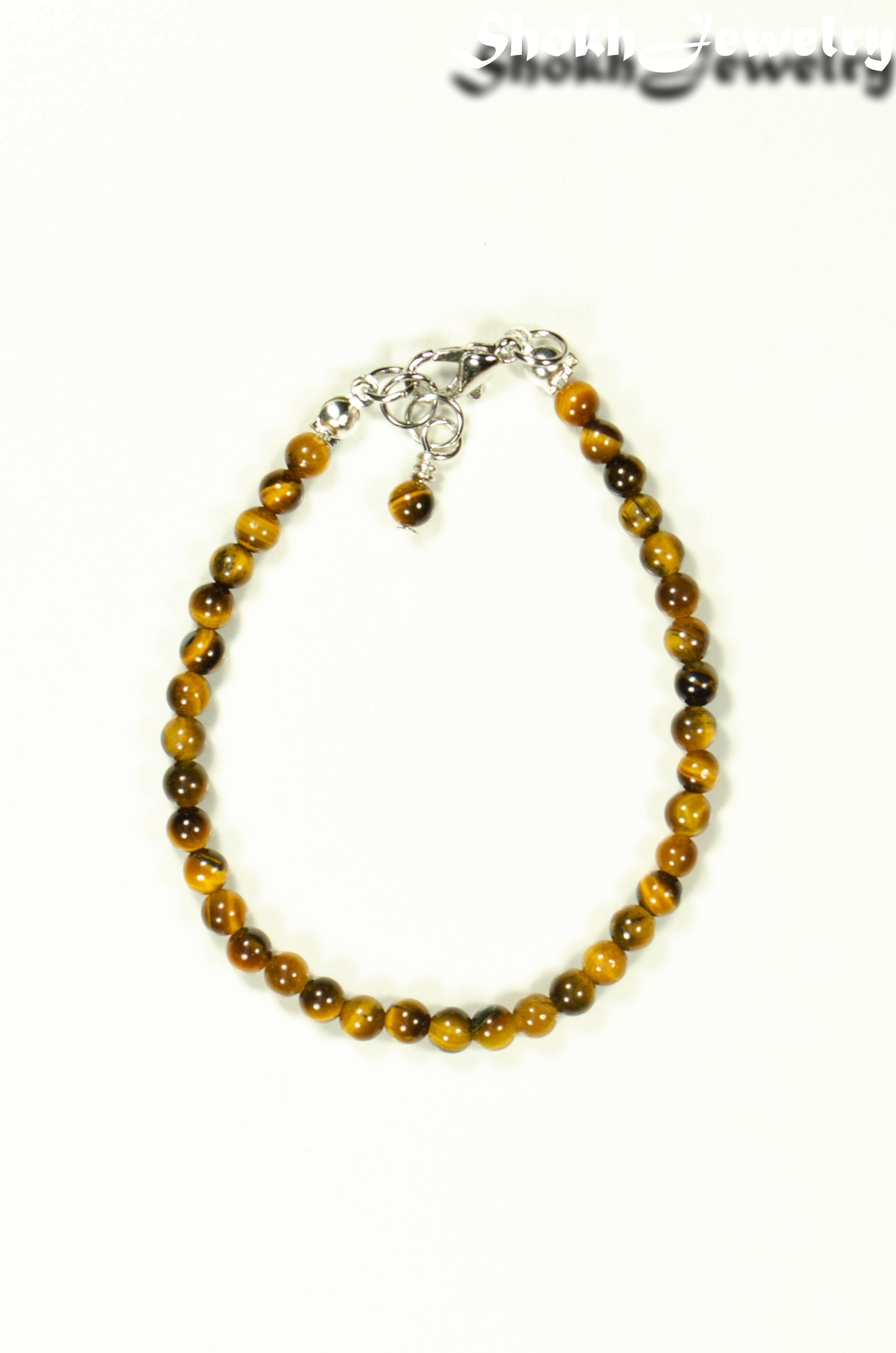 Top view of 4mm Tiger's Eye anklet with Clasp.