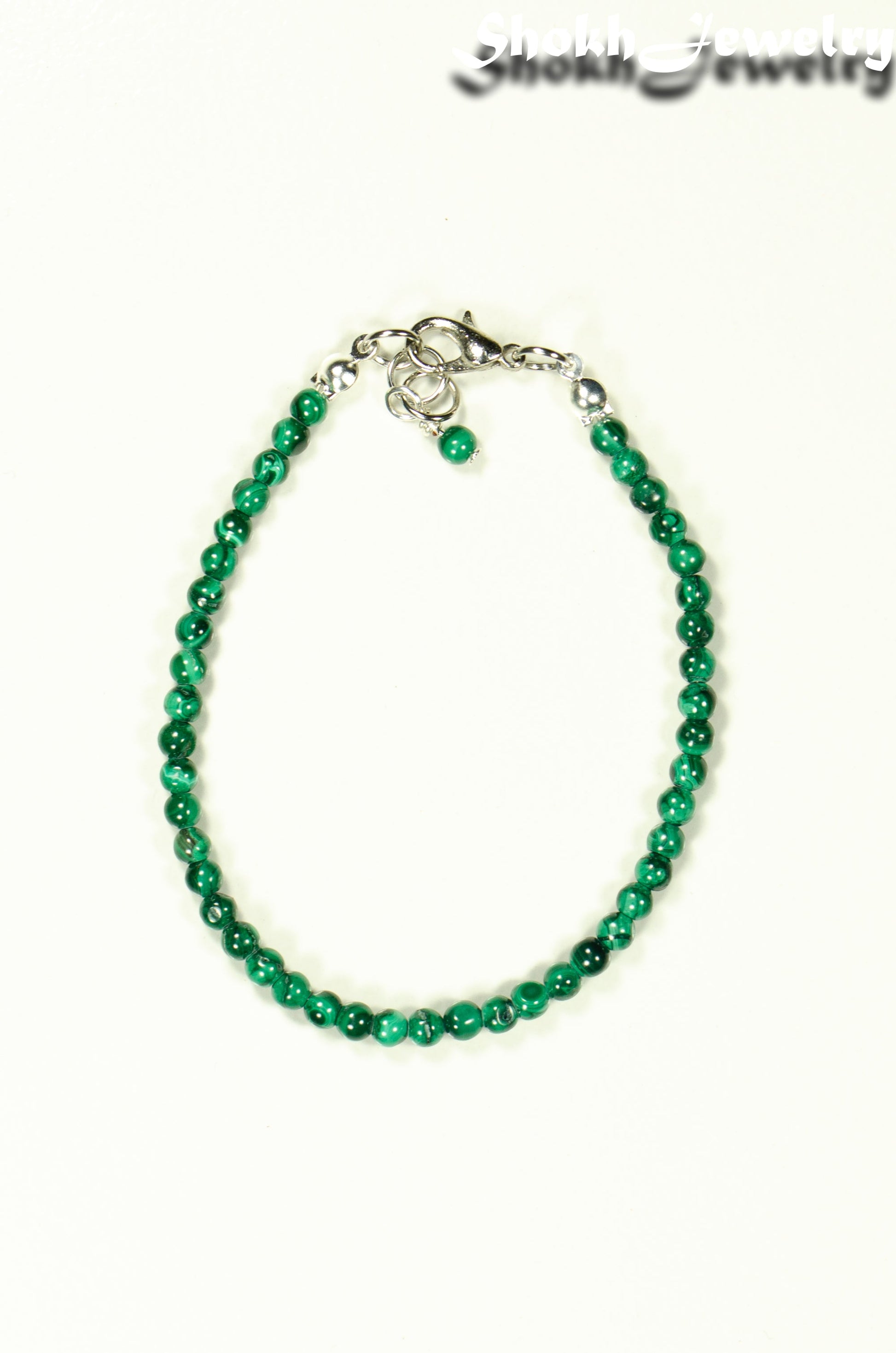 Top view of 3mm Natural Malachite anklet with Clasp.