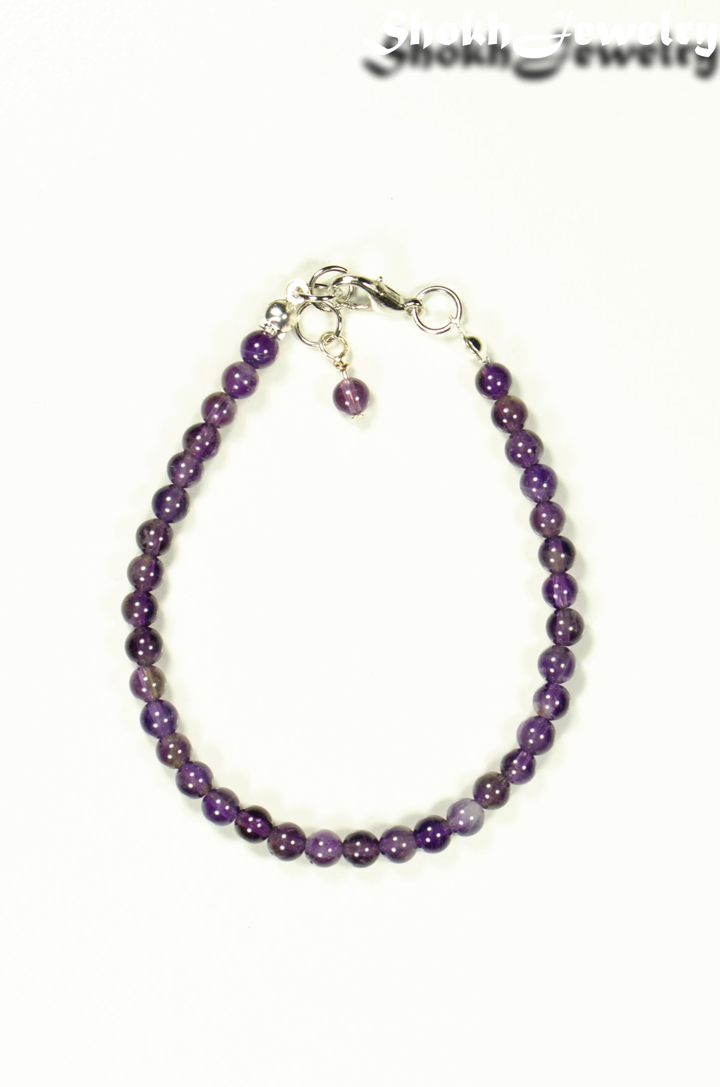 Top view of 4mm Amethyst Bracelet with Clasp.