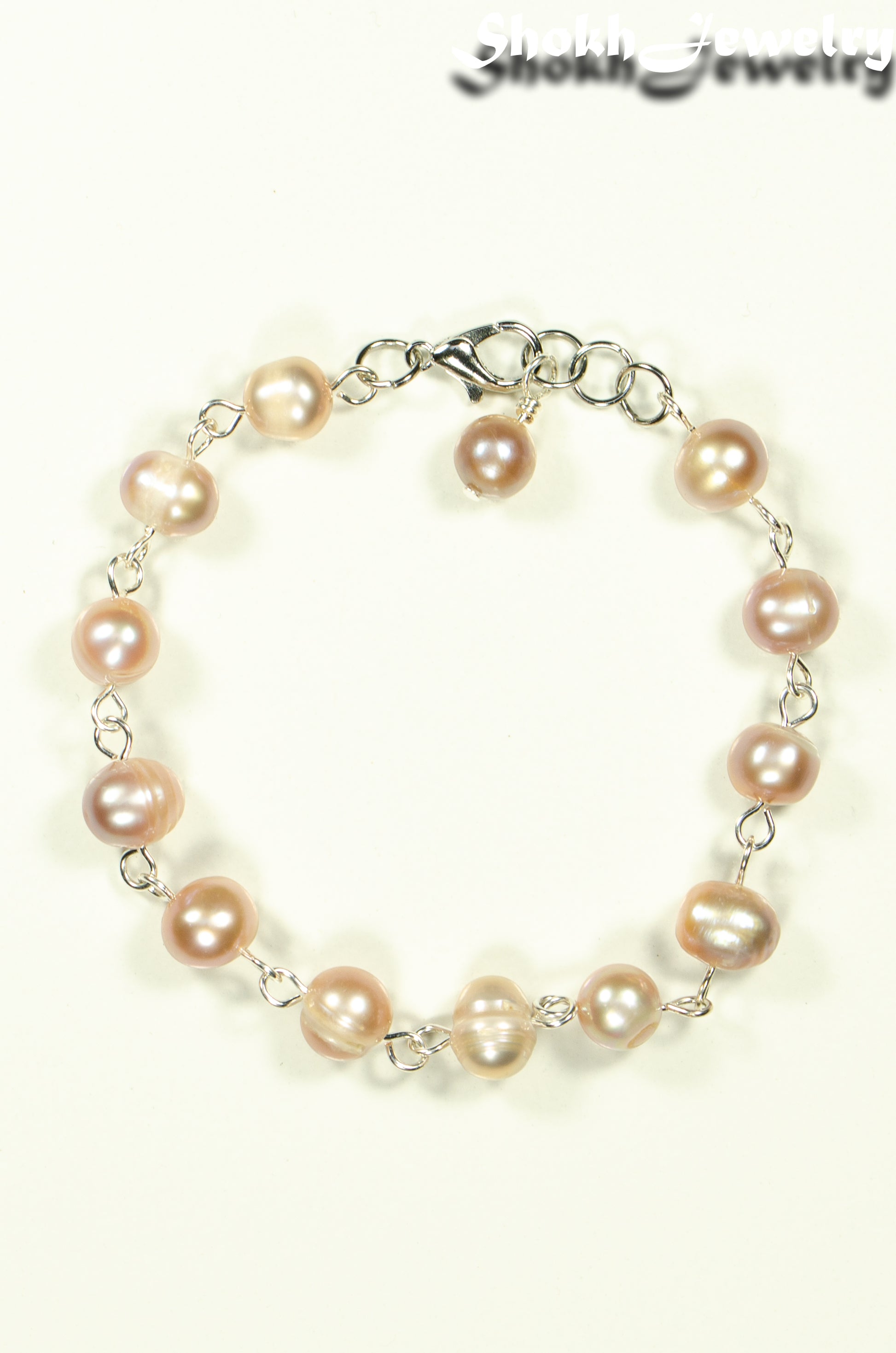 Top view of Lavender Freshwater Pearls Link Chain Bracelet.