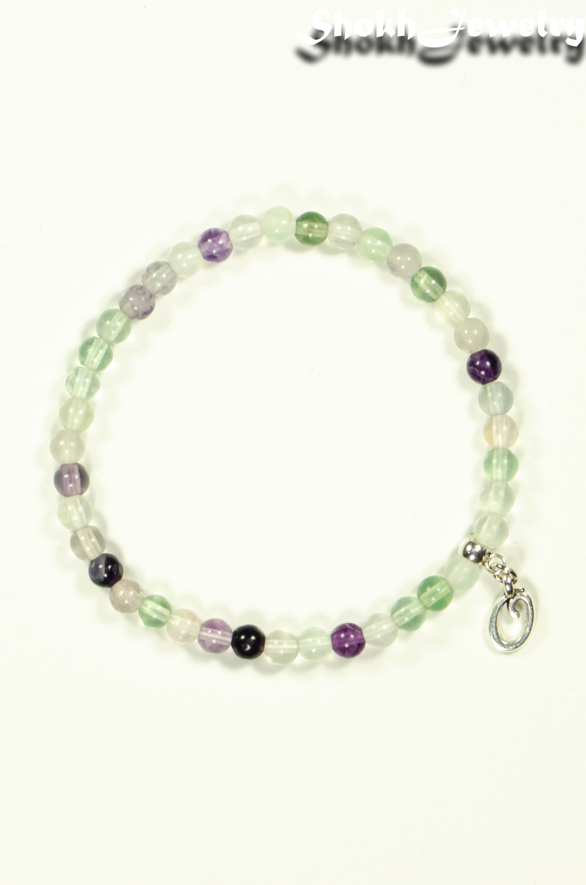 Top view of 4mm Rainbow Fluorite Bracelet with Initial.