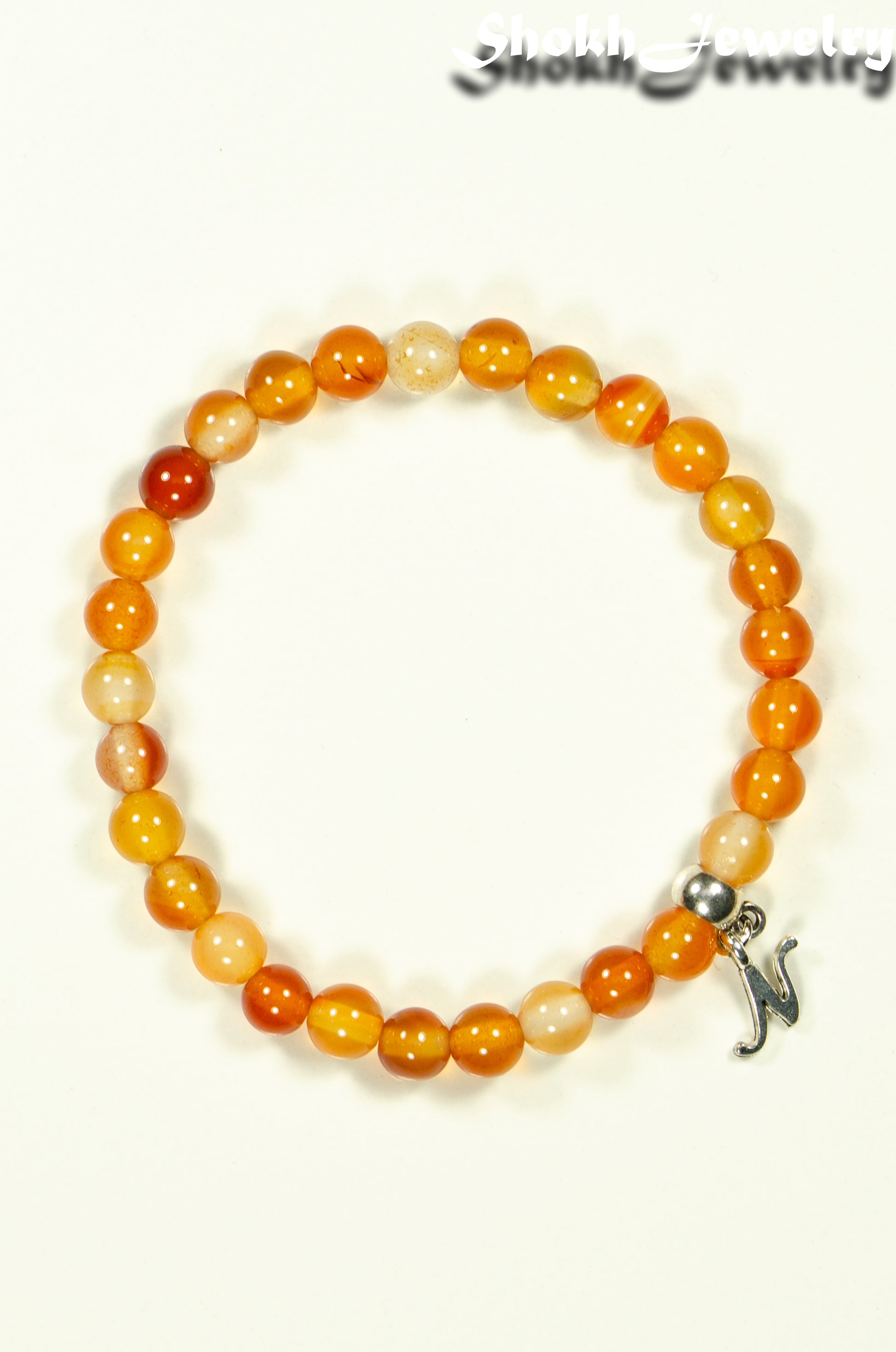 Top view of 6mm Carnelian Bracelet with Initial.