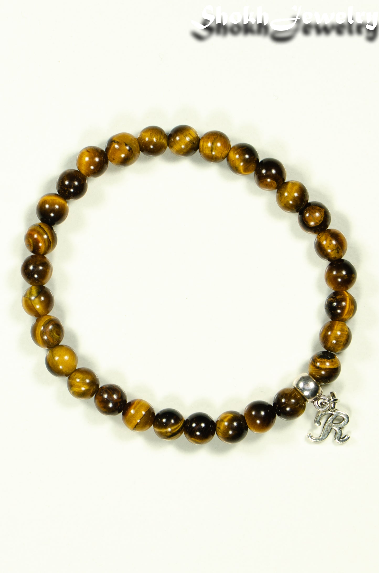 Top view of 6mm Tiger's Eye Bracelet with Initial.