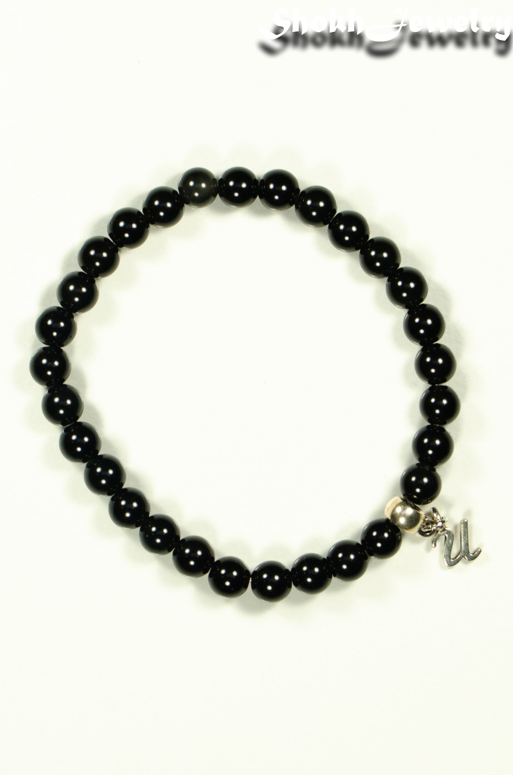 Top view of 6mm Black Obsidian Bracelet with Initial.