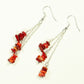 Top view of Long Silver Plated Chain and Red Coral Chip Earrings.