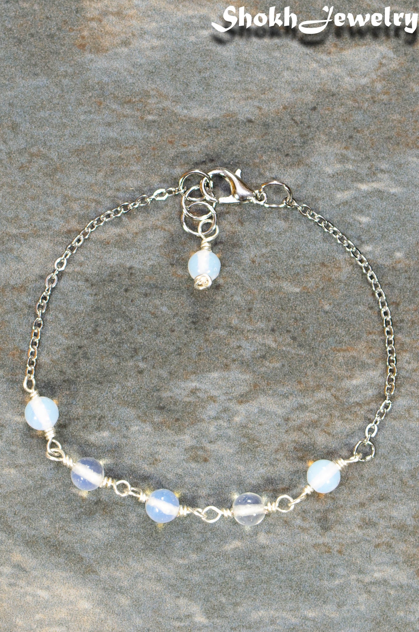 Top view of White Opal and Stainless Steel Chain Bracelet.