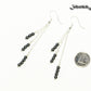 Silver Plated Chain and Natural Hematite Earrings beside a dime.