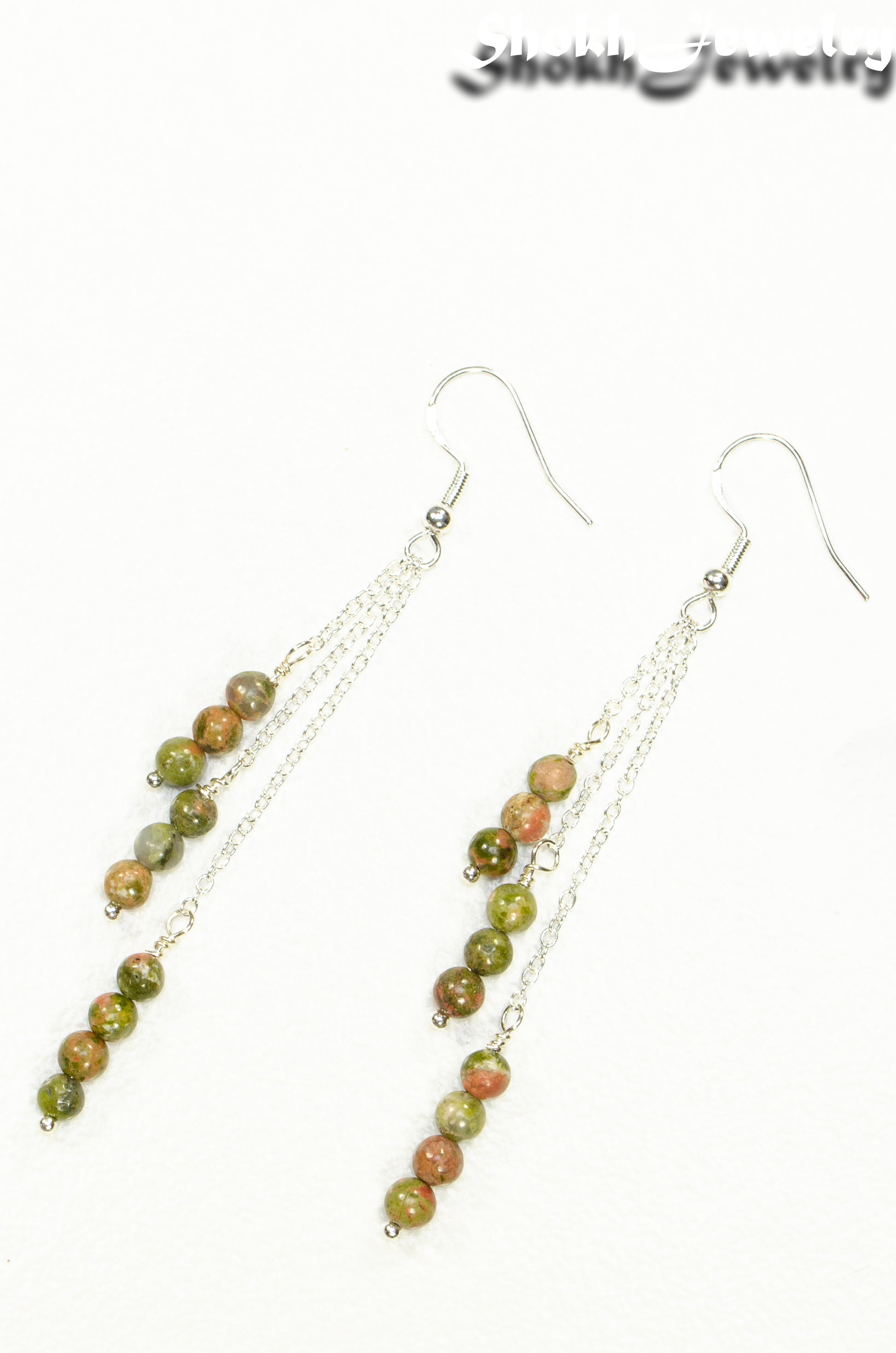 Top view of Silver Plated Chain and Unakite Stone Earrings.