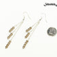 Silver Plated Chain and Smoky Quartz Crystal Earrings beside a dime.