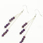 Top view of Silver Plated Chain and Amethyst Crystal Earrings.