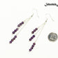 Silver Plated Chain and Amethyst Crystal Earrings beside a dime.