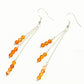 Top view of Silver Plated Chain and Carnelian Crystal Earrings.