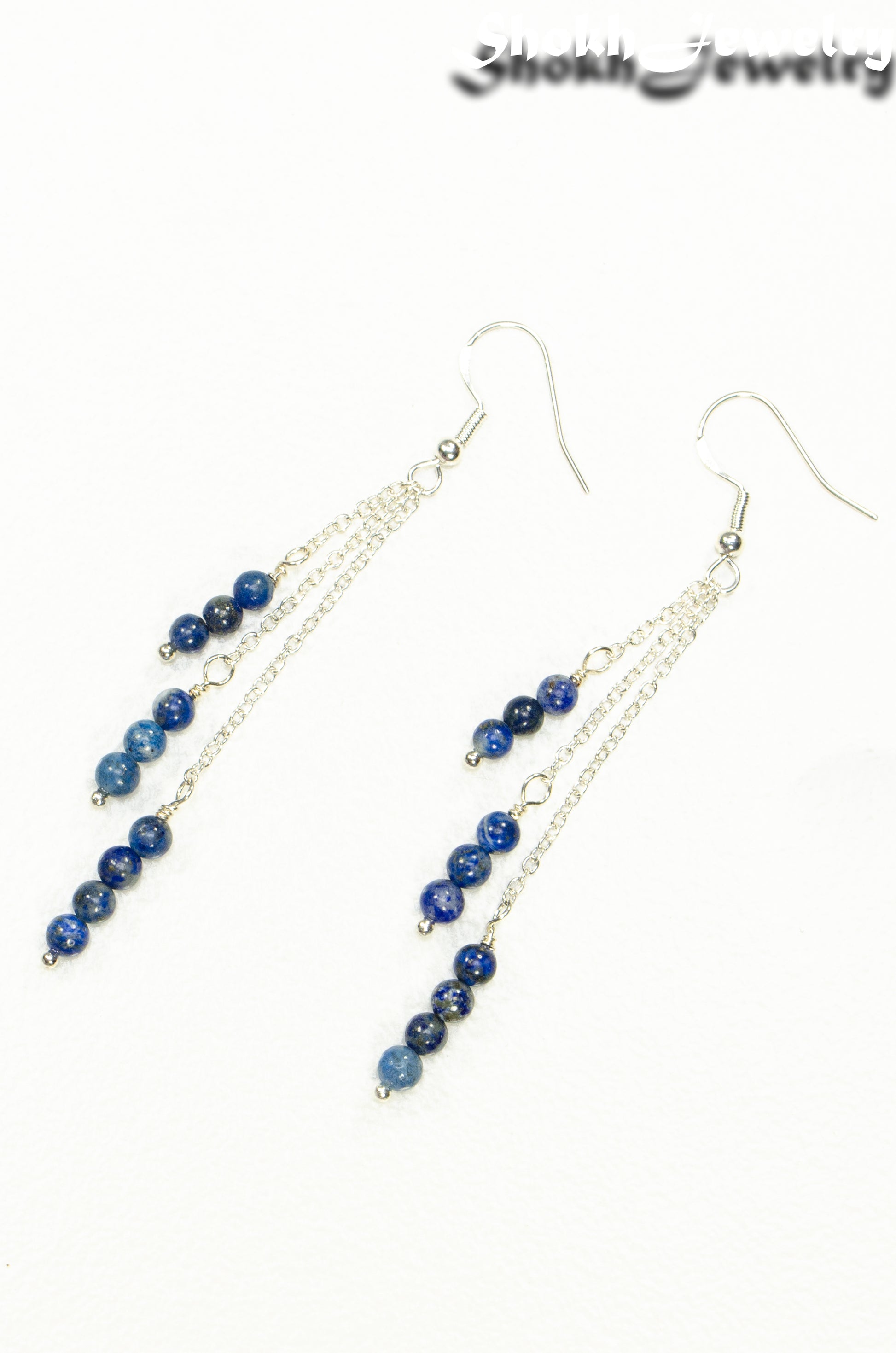 Top view of Silver Plated Chain and Lapis Lazuli Stone Earrings.