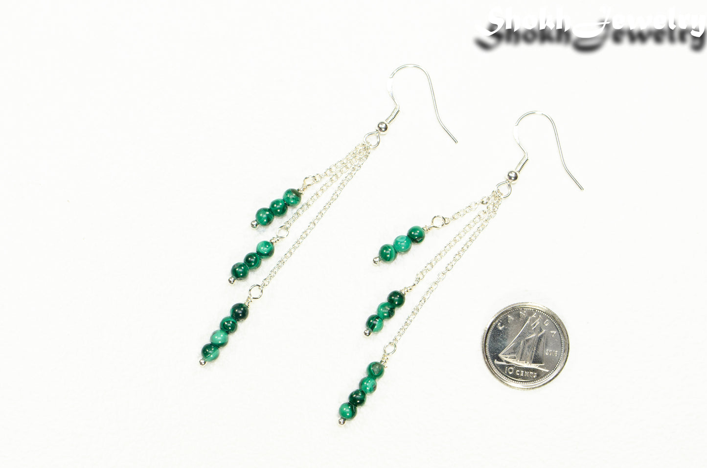Silver Plated Chain and Malachite Stone Earrings beside a dime.