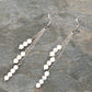 Top view of Silver Plated Chain and White Howlite Earrings.