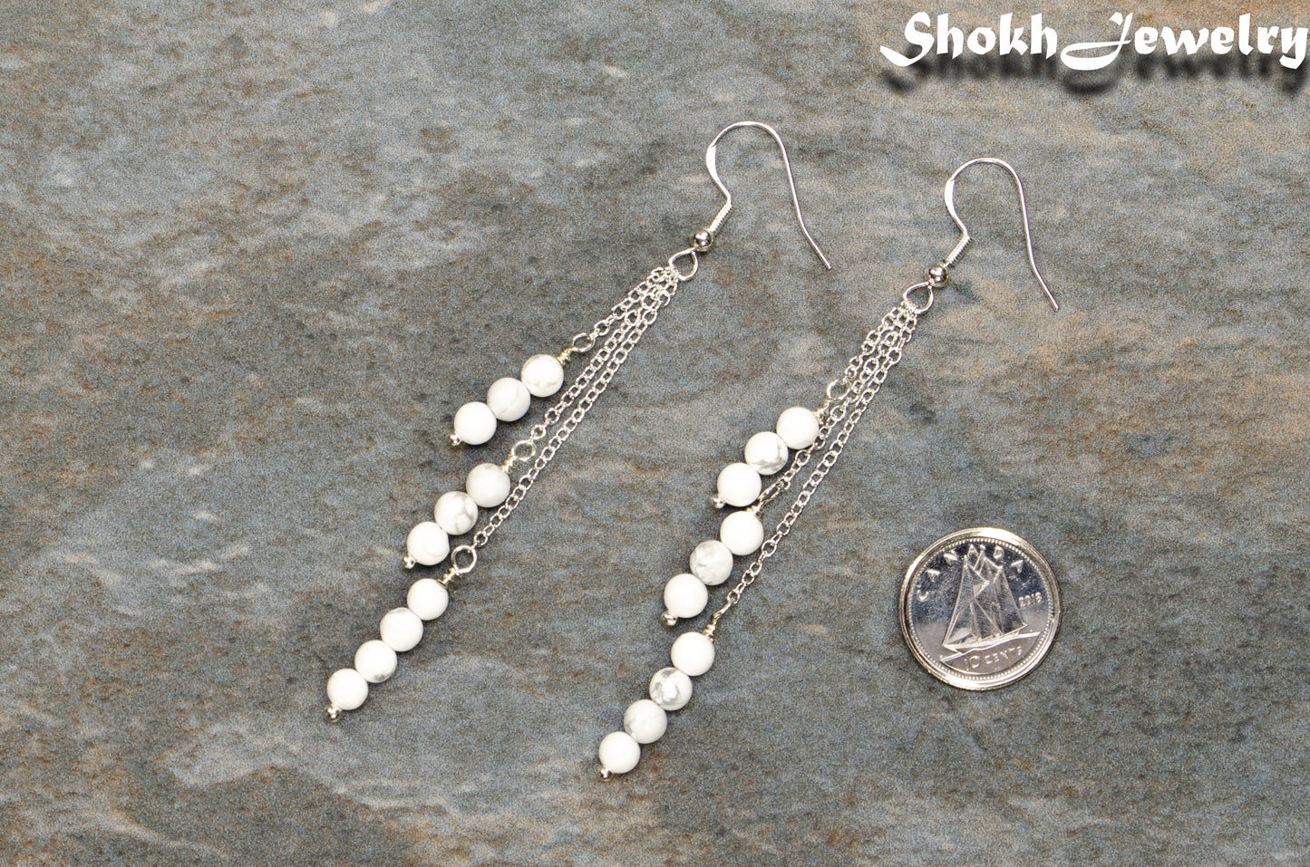 Silver Plated Chain and White Howlite Earrings beside a dime.