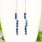 Close up of Silver Plated Chain and Lapis Lazuli Stone Earrings.