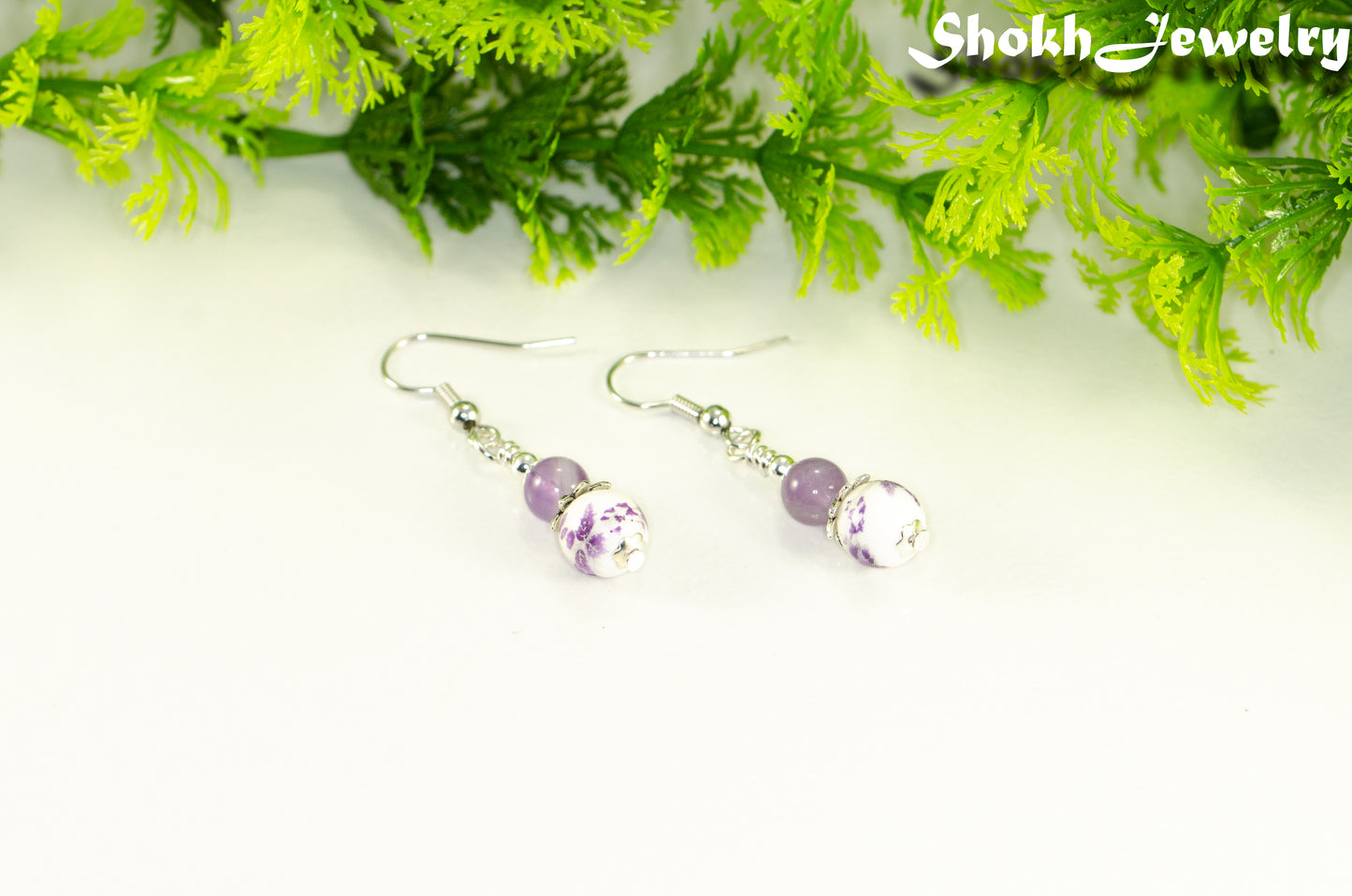 Small Floral Ceramic Bead and Amethyst Earrings.