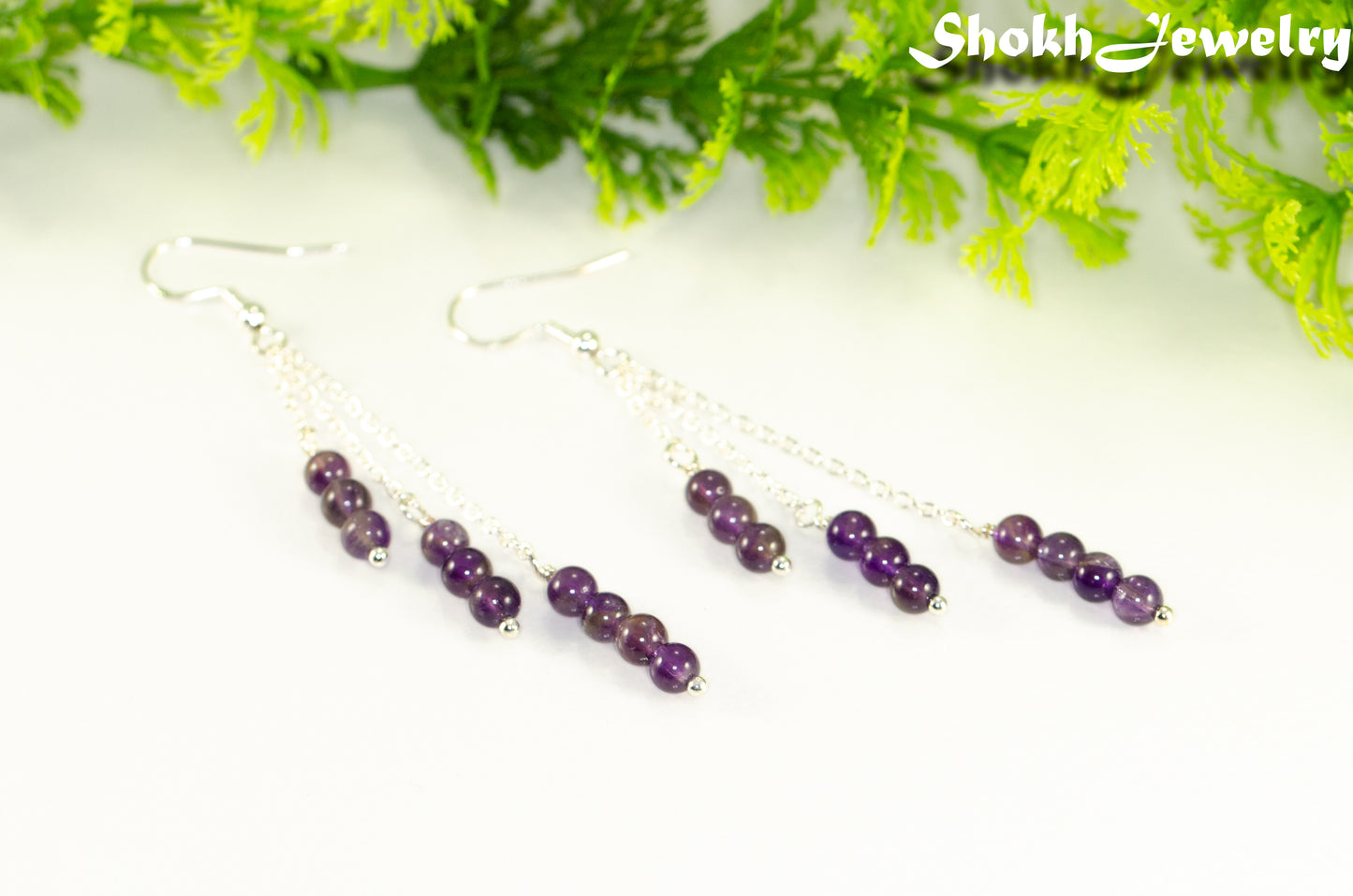 Silver Plated Chain and Amethyst Crystal Earrings.