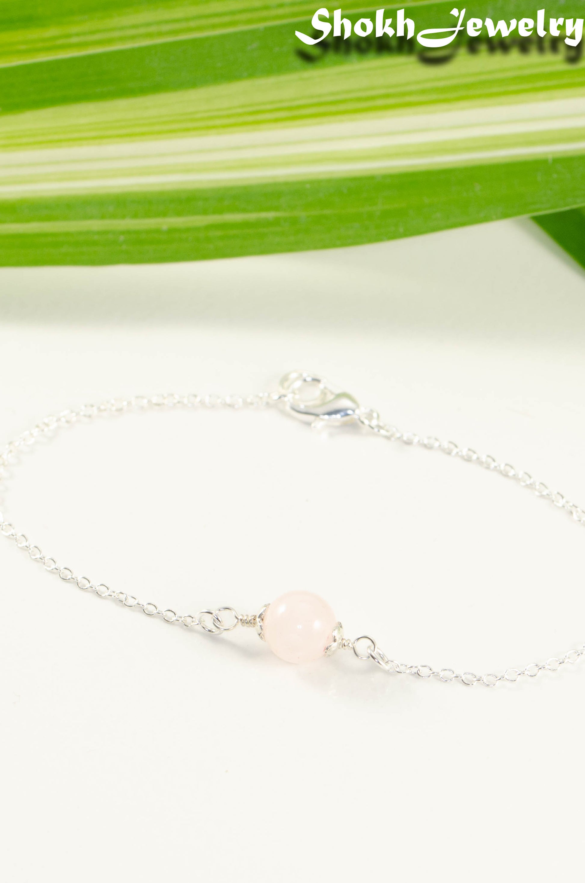 Close up of Minimal Rose Quartz Bracelet.