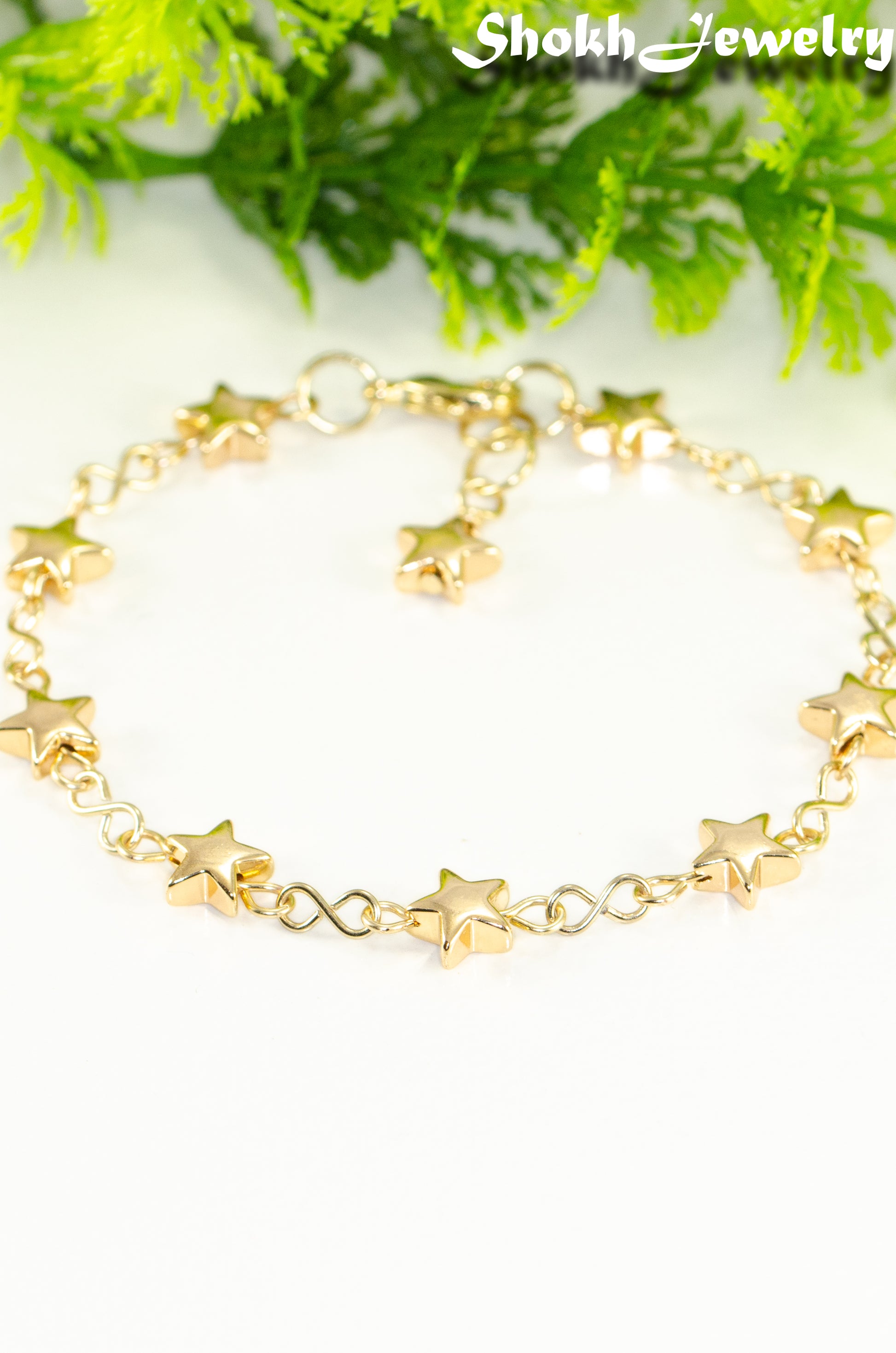 Close up of Gold plated Hematite Star Link Bracelet.