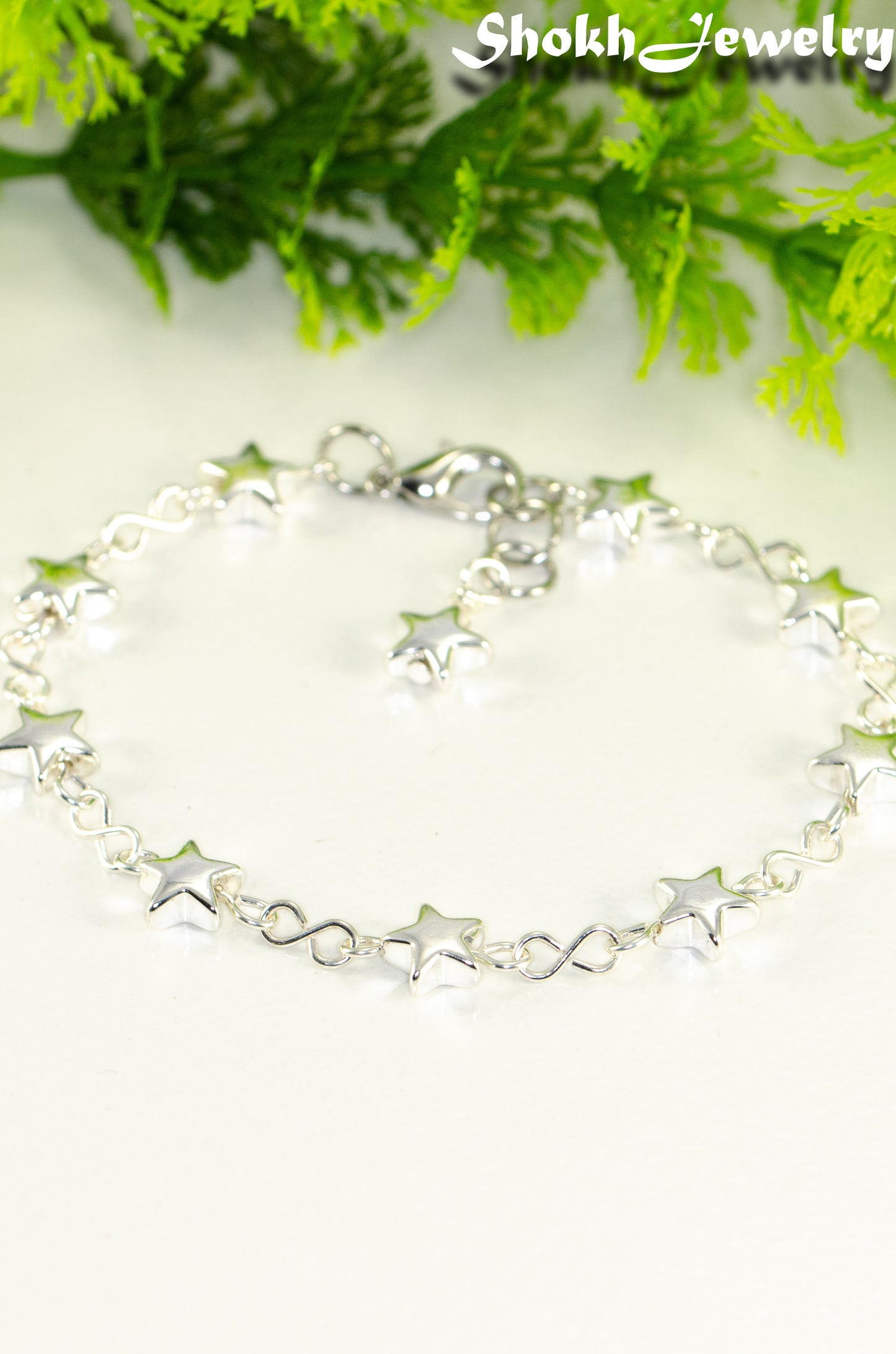 Close up of Silver plated Hematite Star Link Bracelet.