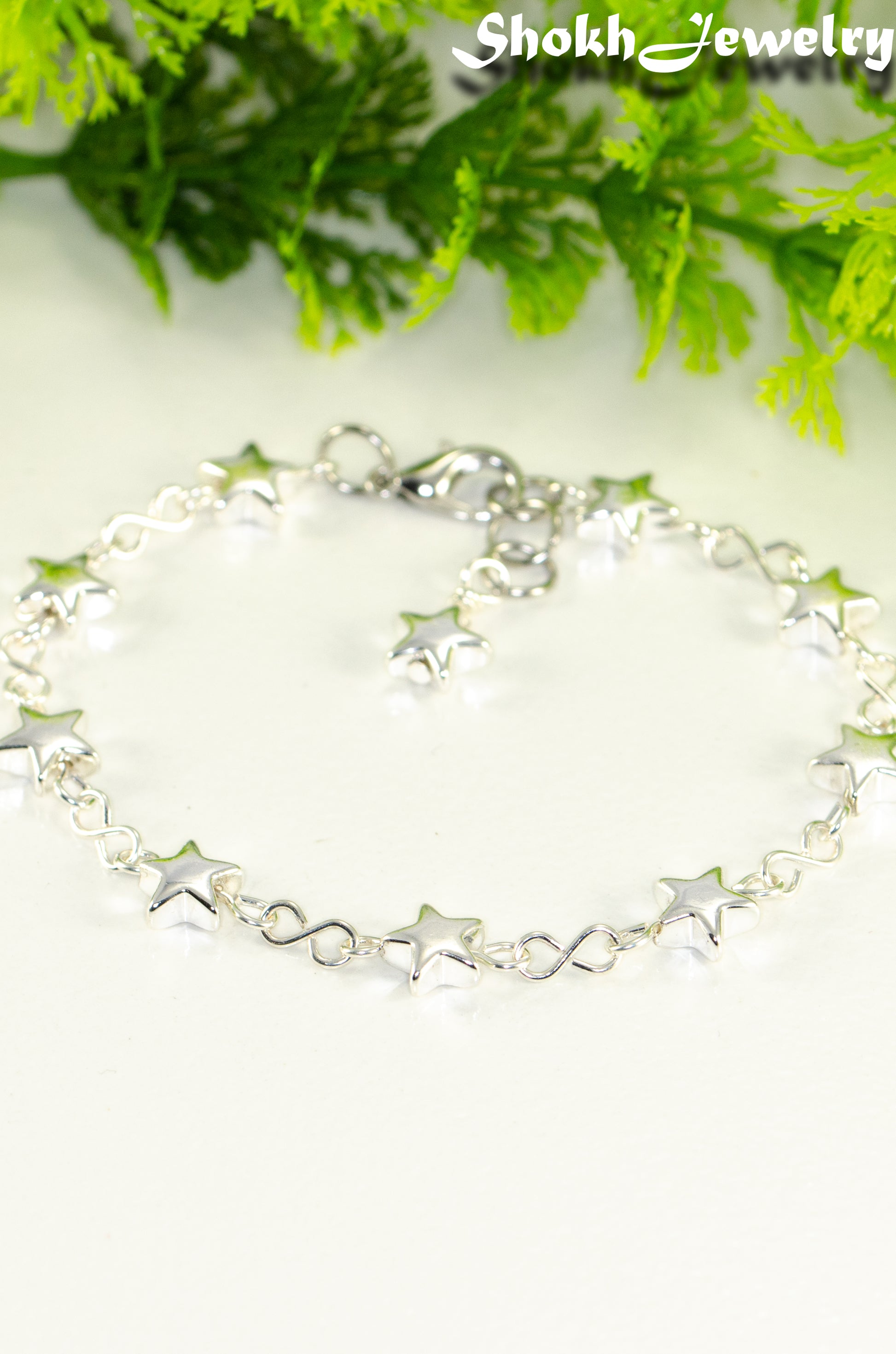 Close up of Silver plated Hematite Star Link Bracelet.