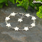 Natural Seashell Star Link Bracelet with lobster claw clasp and  a dangling star.