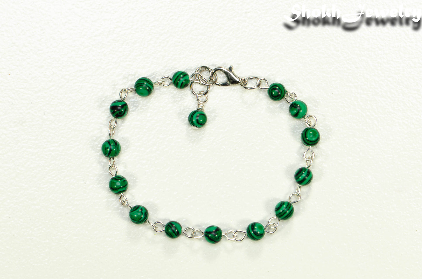 Top view of 6mm Malachite Link chain anklet .
