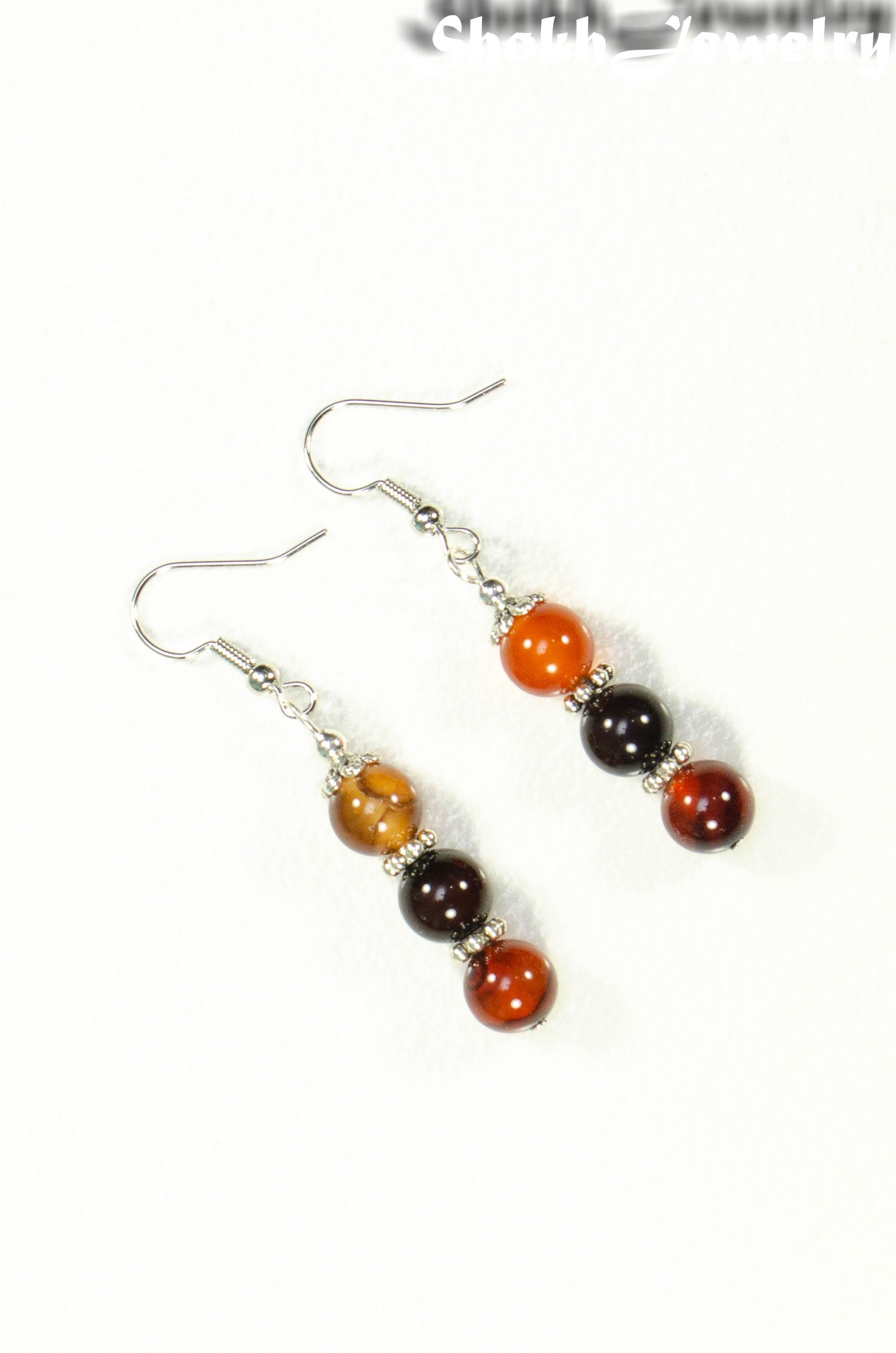 Top view of Natural Carnelian Beaded Bar Earrings.