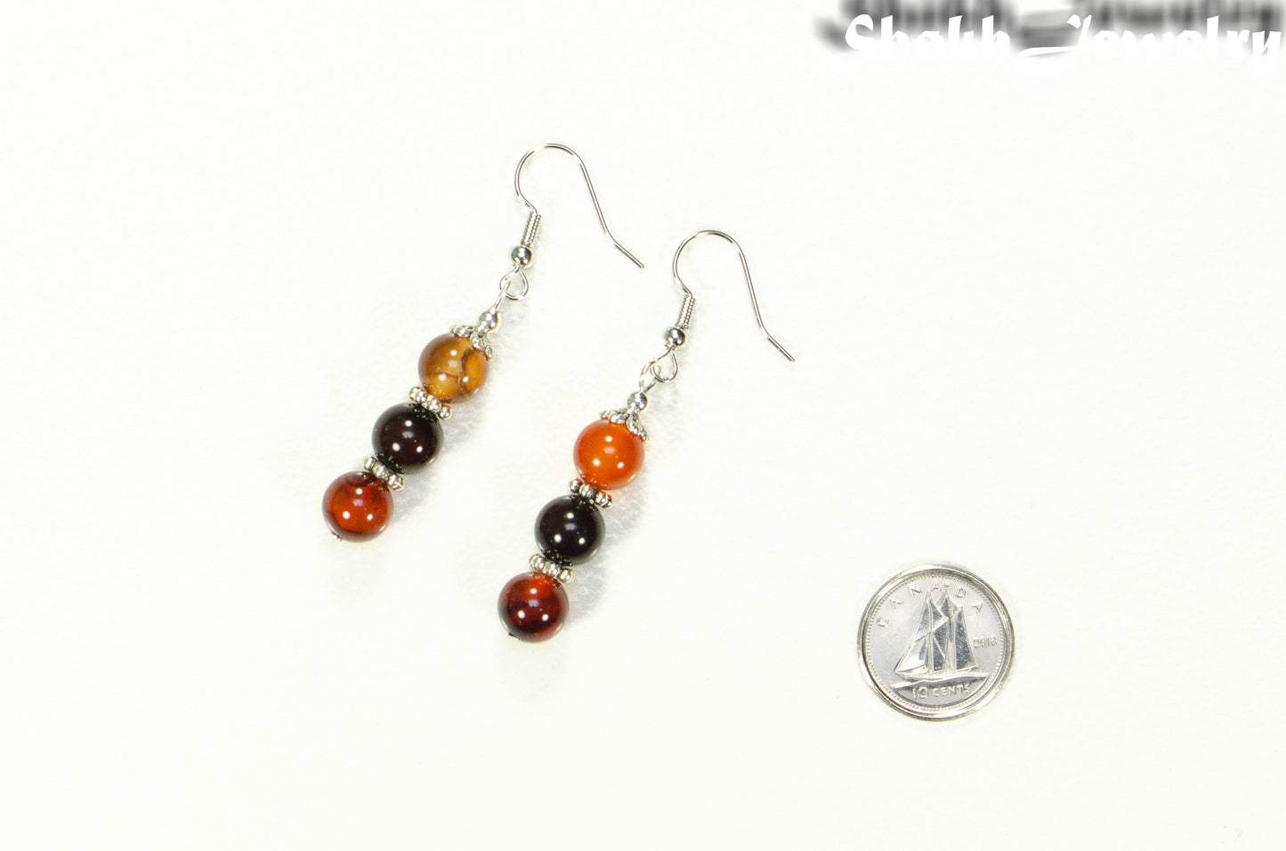 Natural Carnelian Beaded Bar Earrings beside a dime.