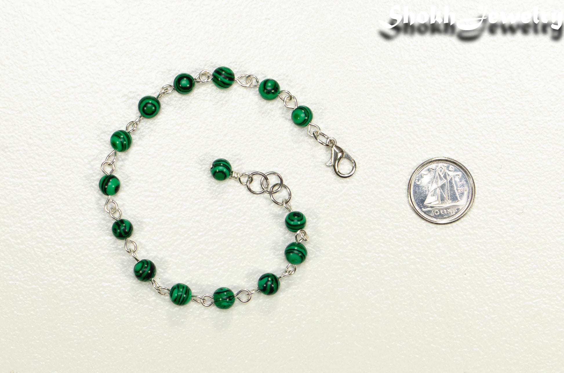 6mm Malachite Link chain anklet beside a dime.