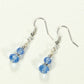 Top view of Small Light Blue Glass Bead Dangle Earrings.