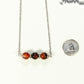 Carnelian and Dainty Chain Choker Necklace beside a dime.