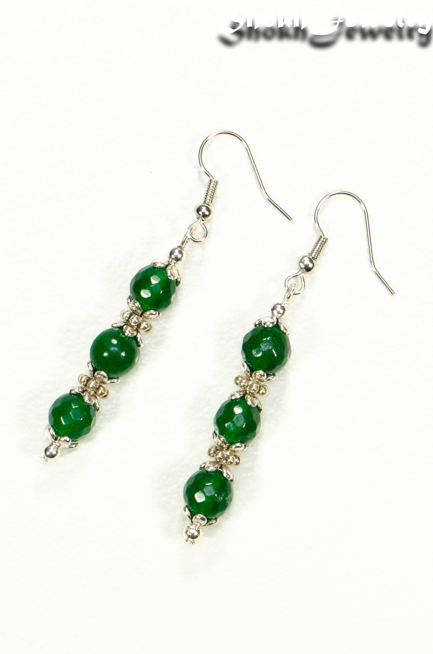 Top view of Natural Emerald Beaded Bar Earrings.