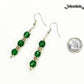 Natural Emerald Beaded Bar Earrings beside a dime.