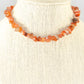 Natural Carnelian Crystal Chip Choker Necklace displayed on a bust.