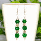 Close up of Natural Emerald Beaded Bar Earrings.