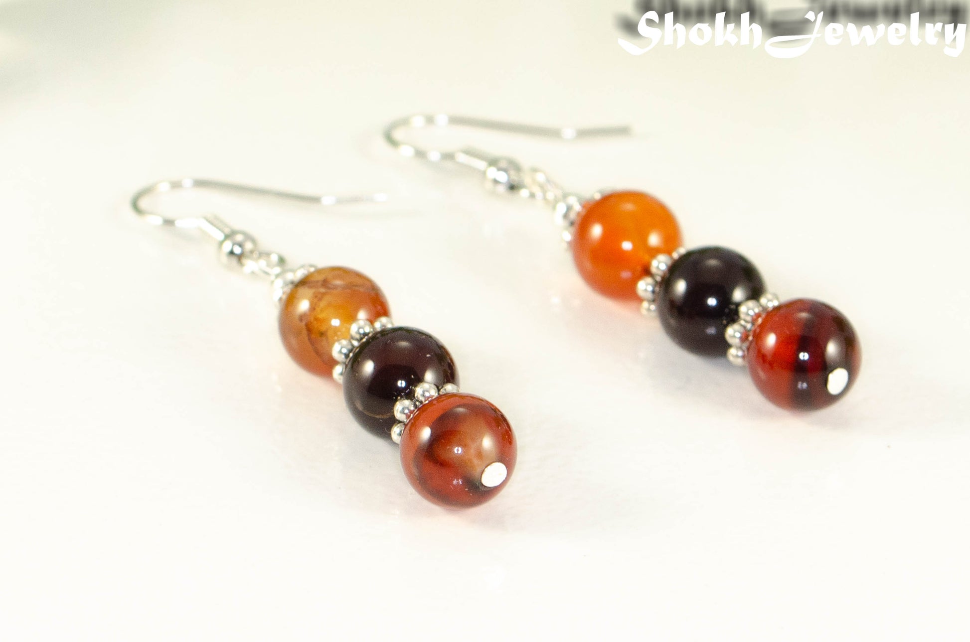 Close up of Natural Carnelian Beaded Bar Earrings.