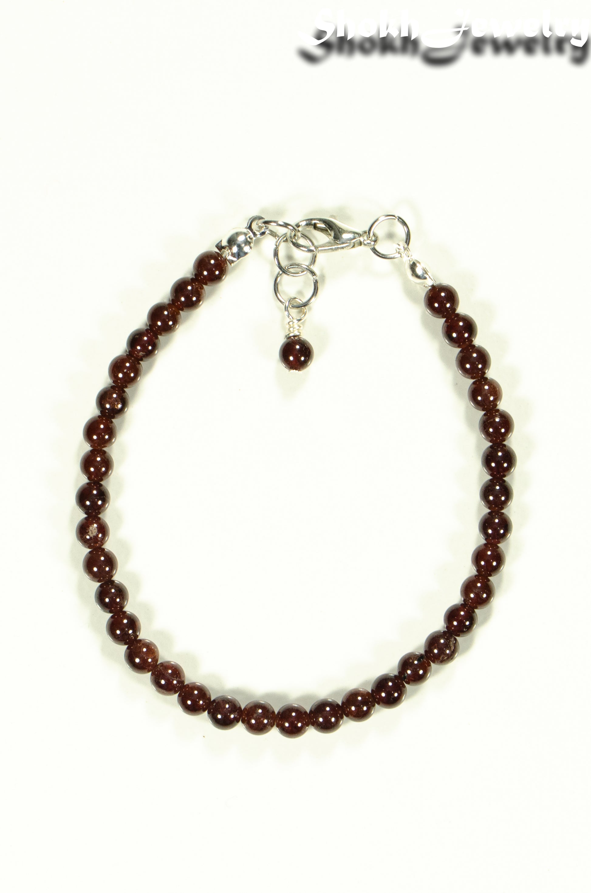 top view of Dainty Garnet Bracelet with Clasp.