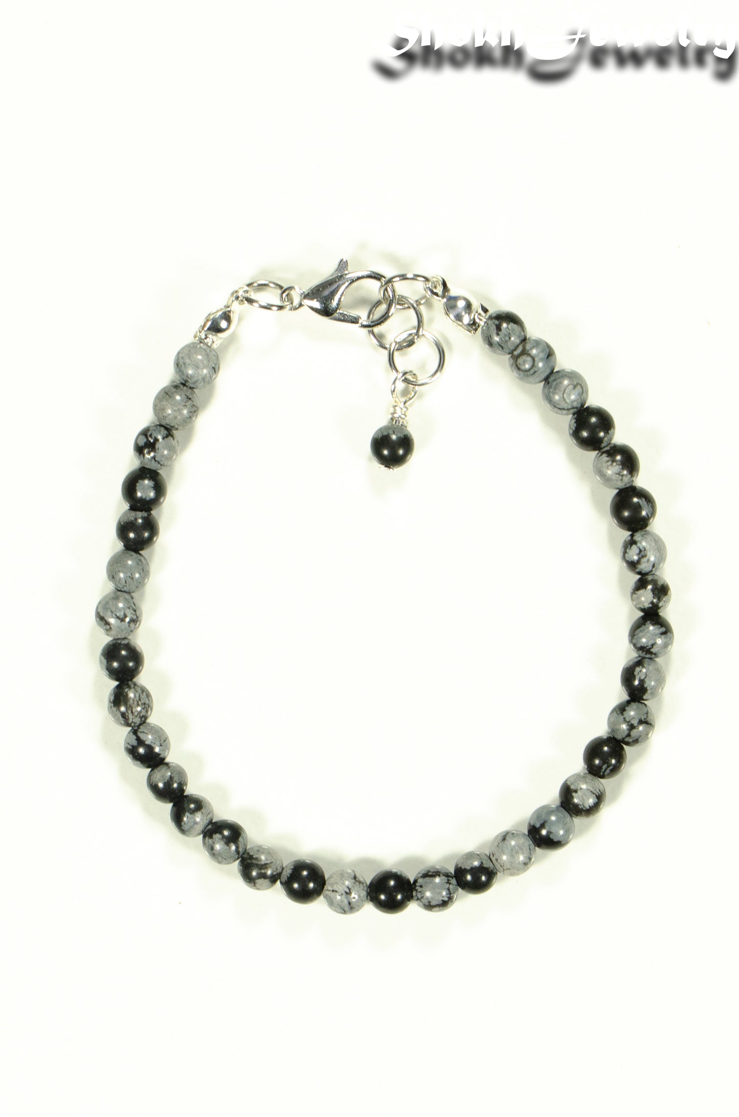 Top view of 4mm Snowflake Obsidian Stone Bracelet with Clasp.