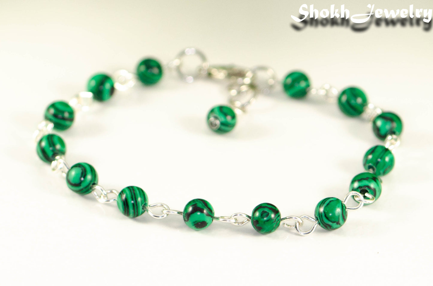 Close up of 6mm Malachite Link chain anklet .