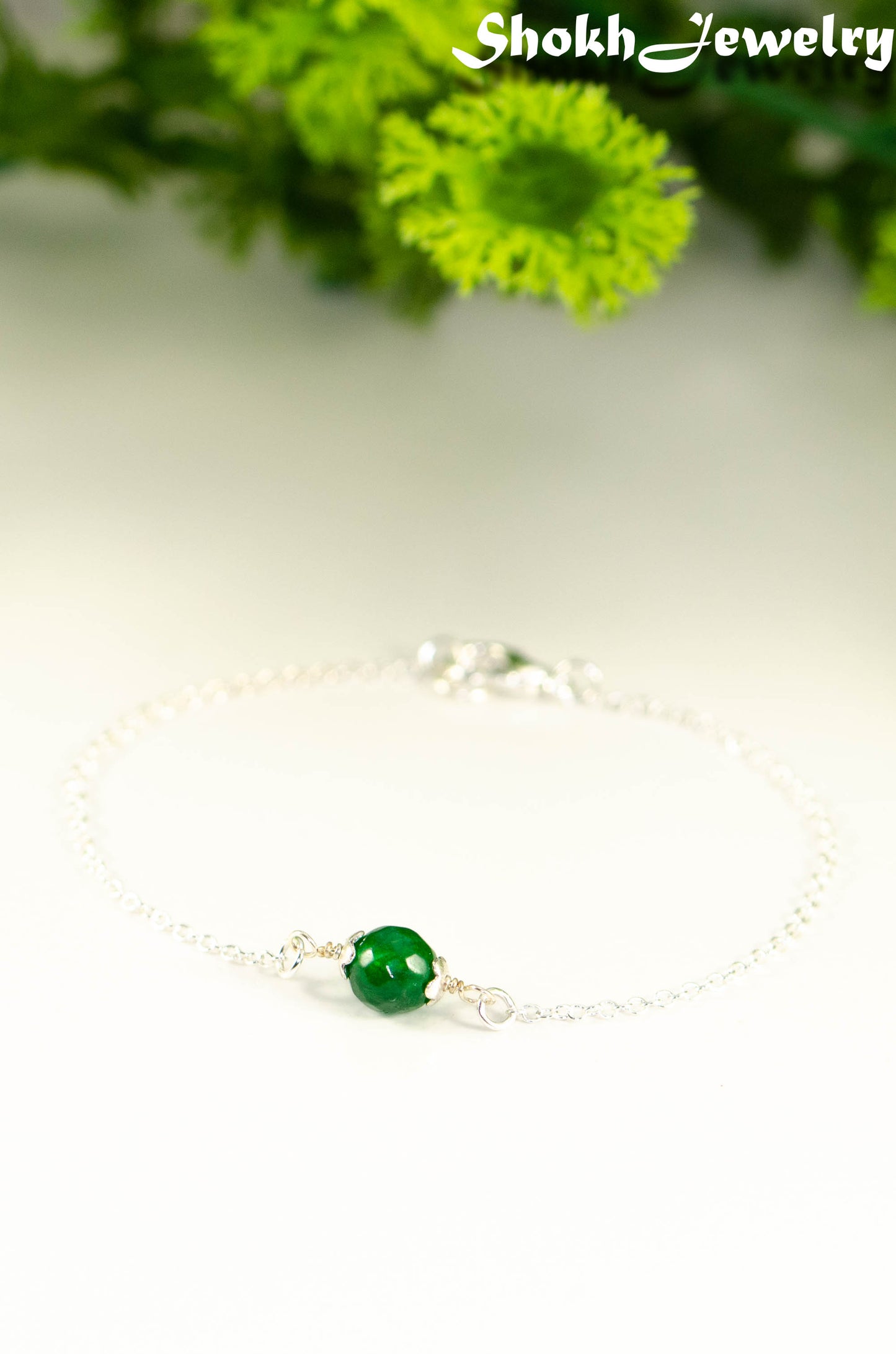 Close up of Minimal Green Emerald Bracelet.