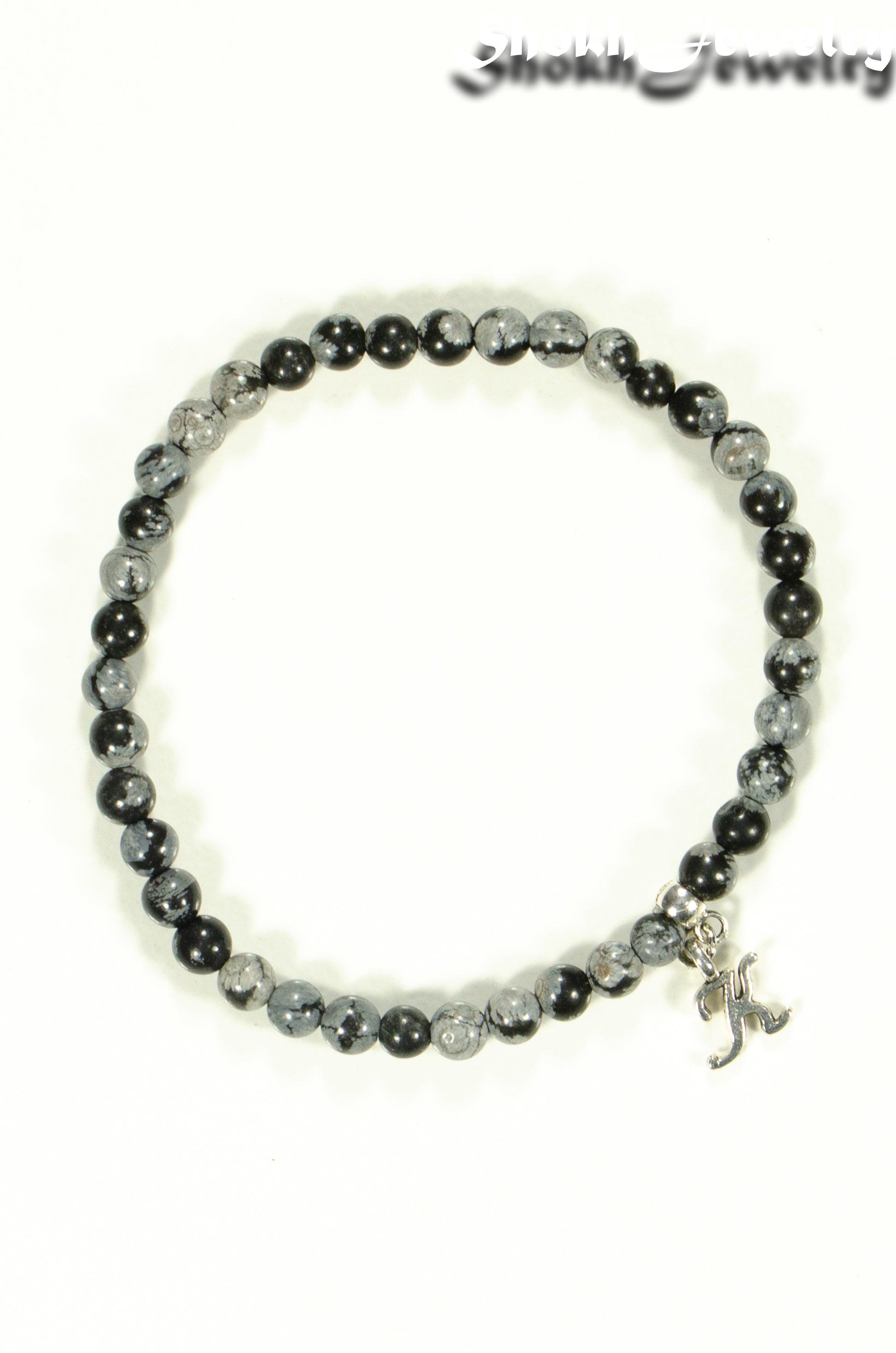 Top view of 4mm Snowflake Obsidian Bracelet with Initial.