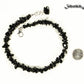 Natural Black Obsidian Crystal Chip Anklet beside a dime.