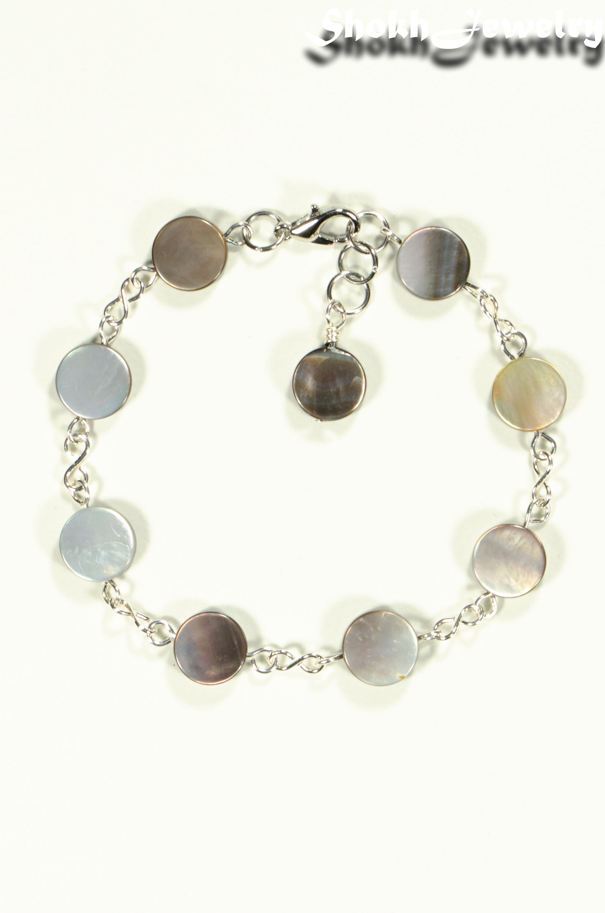 Top view of Grey Seashell Link Bracelet.