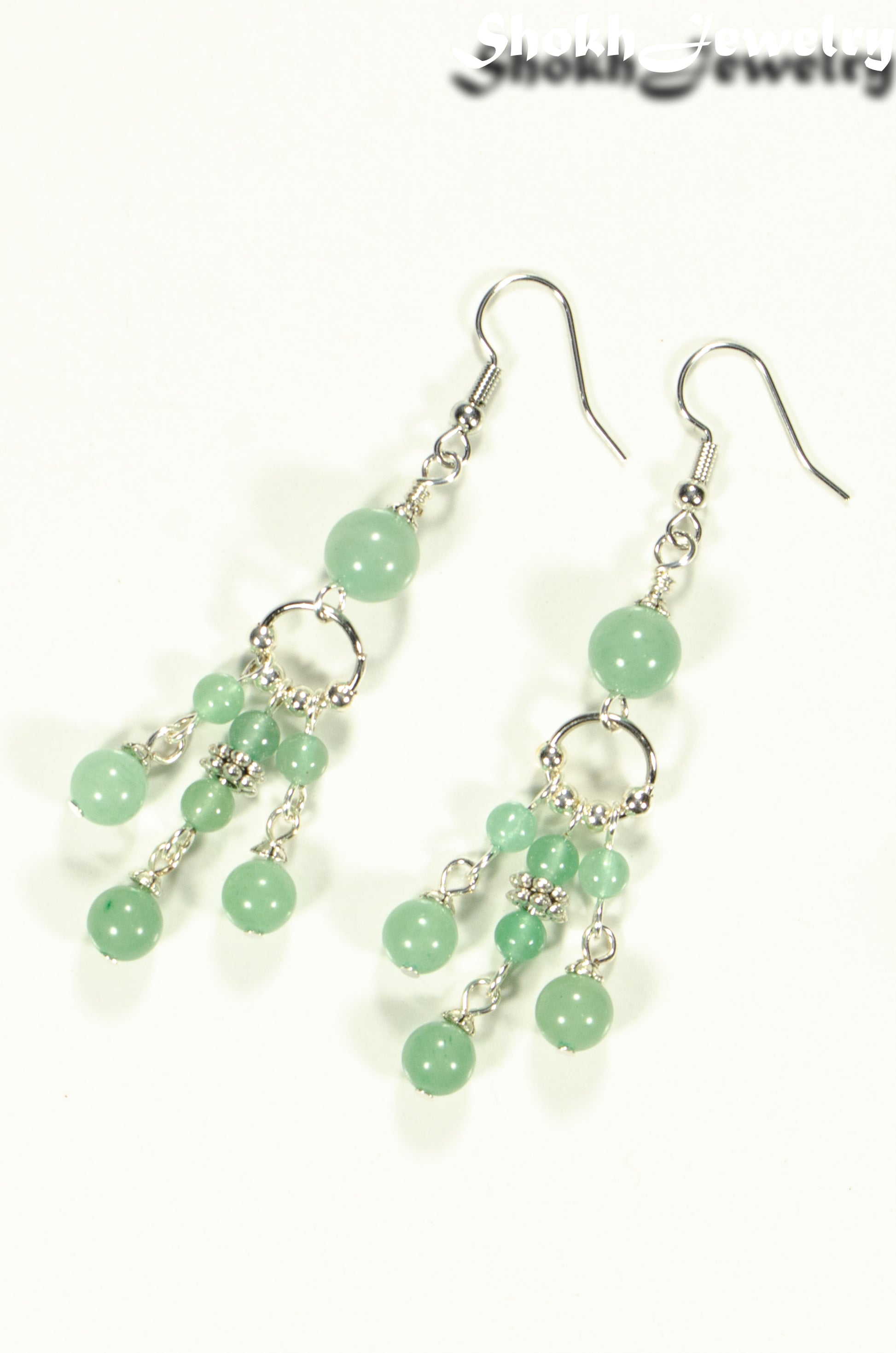 Top view of Statement Green Aventurine Crystal Chandelier Earrings.