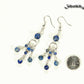 Statement Lapis Lazuli Chandelier Earrings beside a dime.